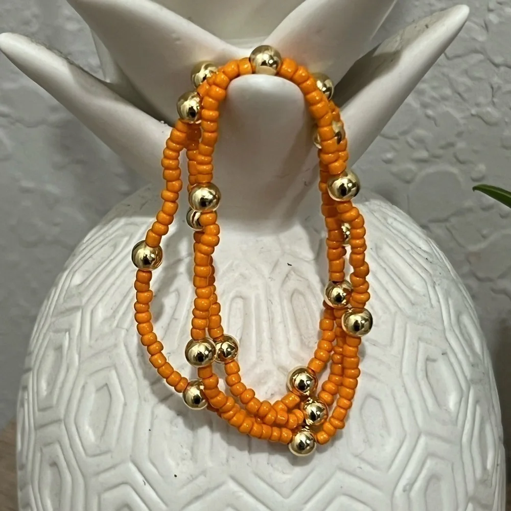 Orange beaded gold filled handmade bracelet